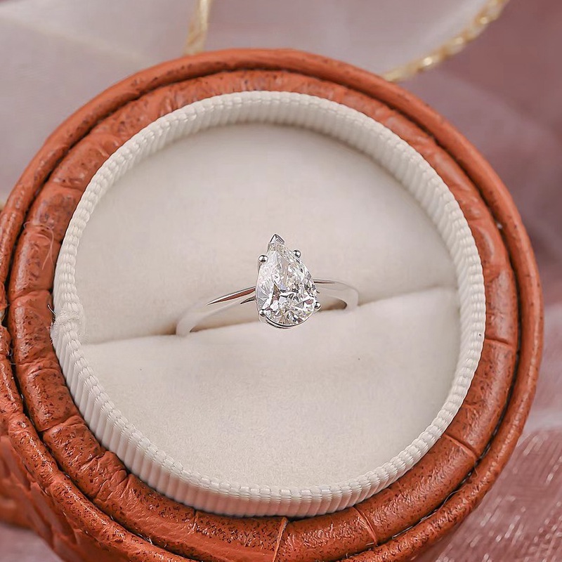 LAOTLON Pear Shaped Diamond Ring In Solitaire Style