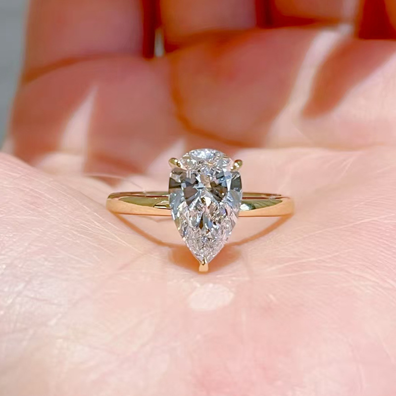 LAOTLON Pear Cut Engagement Ring In Muse Setting