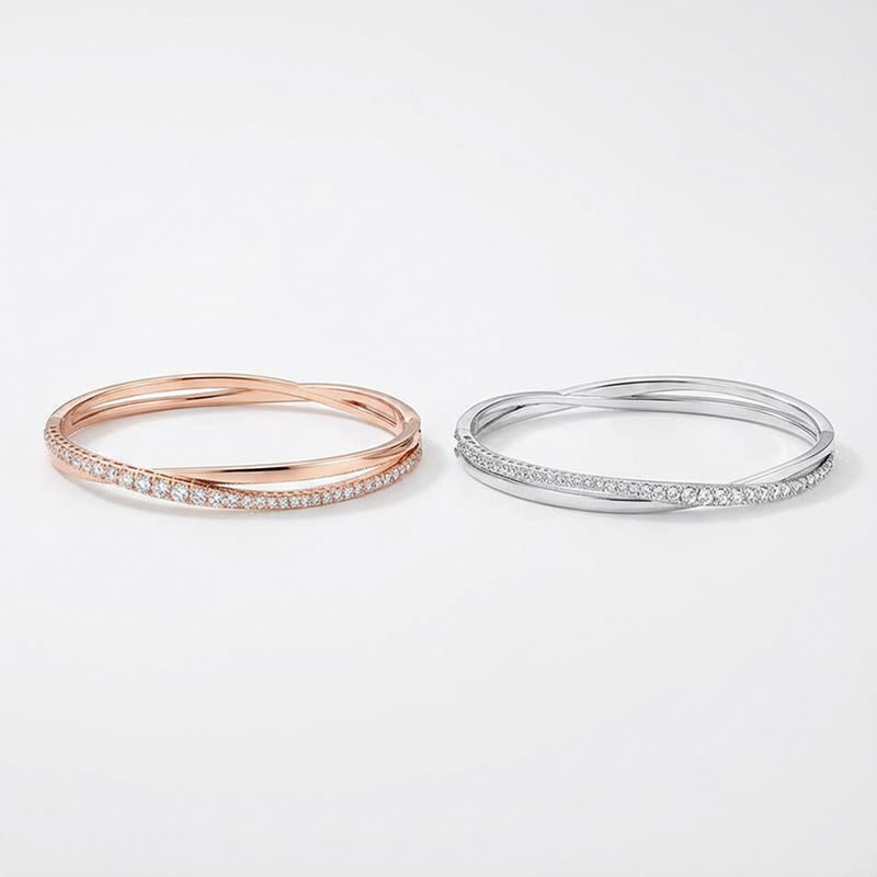 TAOLON Intertwined Sparkle: Pavé Crystal Cross Bangle
